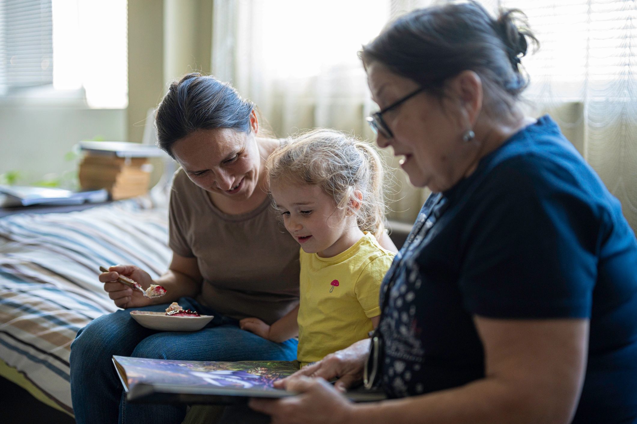 Family bonding while reading together at home